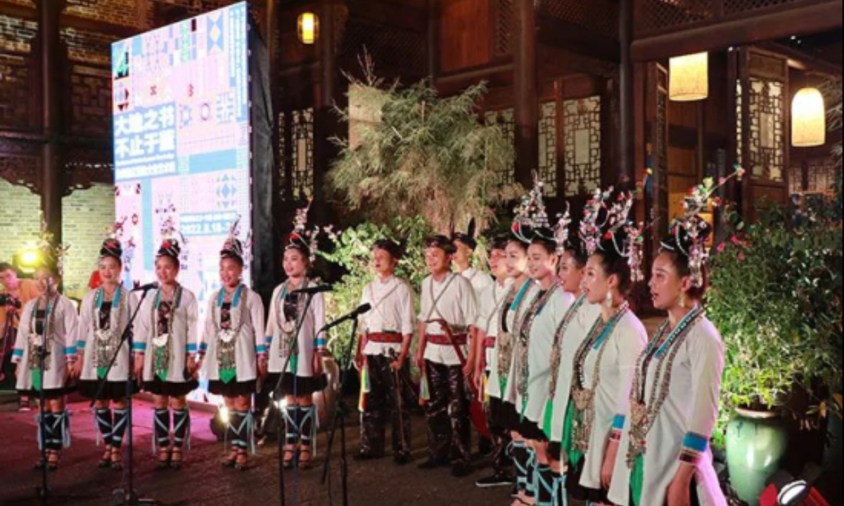 Locals of Dong ethnic group sing at the ethnic art festival in Southeast China's Guizhou Province, which seeks to get visitors excited about the local culture. Photo: Courtesy of Xin Yao 