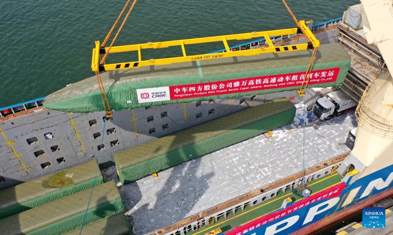 Photo taken on Aug. 18, 2022 shows a high-speed electric passenger train, customized for the Jakarta-Bandung High-Speed Railway, being loaded on a vessel in Qingdao Port of East China's Shandong Province. Photo: Xinhua