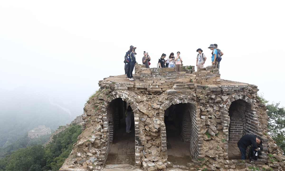 Tourists visit a defensive tower along the Great Wall in Beijing's Huairou district. Photo: IC The 2022 Beijing Great Wall Cultural Festival Photo: Lin Xiaoyi/GT 
