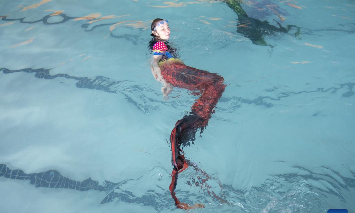 Trainees practise mermaid swimming at the Merschool in Johannesburg, South Africa, Aug 26, 2022. Photo:Xinhua