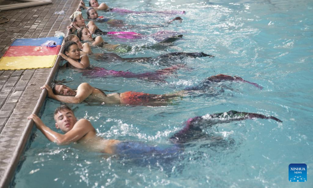 Trainees practise mermaid swimming at the Merschool in Johannesburg, South Africa, Aug 26, 2022. Photo:Xinhua