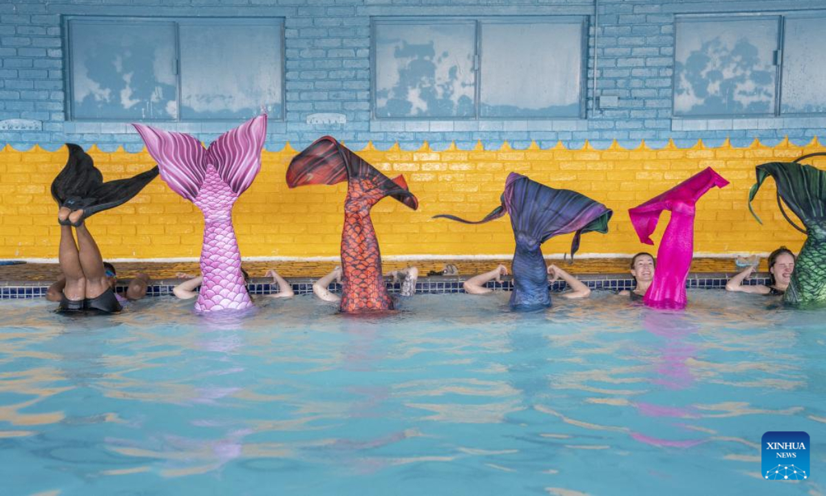 Trainees practise mermaid swimming at the Merschool in Johannesburg, South Africa, Aug 26, 2022. Photo:Xinhua