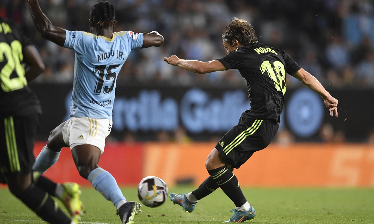 Real Madrid’s Croatian midfielder Luka Modric scores his team’s second goal during the Spanish League soccer match between RC Celta de Vigo and Real Madrid CF at the Balaidos stadium in Vigo, Spain on August 20, 2022. Photo: AFP 