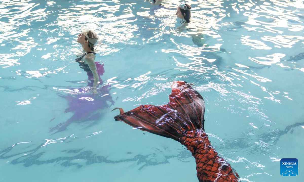 Trainees practise mermaid swimming at the Merschool in Johannesburg, South Africa, Aug 26, 2022. Photo:Xinhua