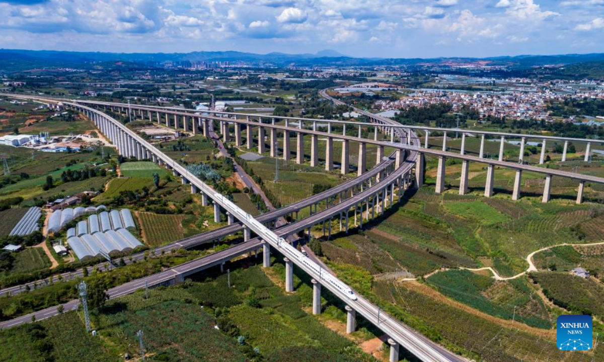 Aerial photo taken on Aug. 23, 2022 shows a comprehensive inspection train running on the Mile-Mengzi high-speed railway near the Mile station in Honghe Hani and Yi Autonomous Prefecture, southwest China's Yunnan Province. The 107-km railway with a designed speed of 250 kilometers per hour started a test run recently. Photo:Xinhua
