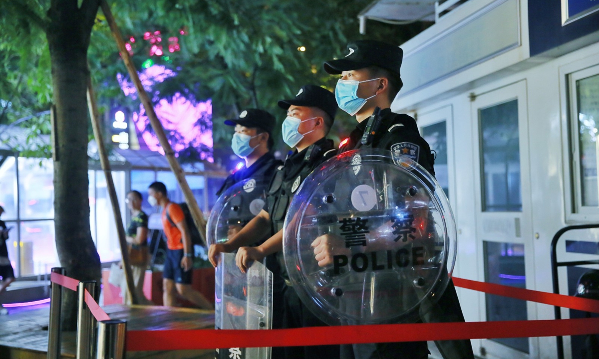 Police patrol at night in Southwest China's Chongqing Municipality on August 9, 2022. Photo: IC