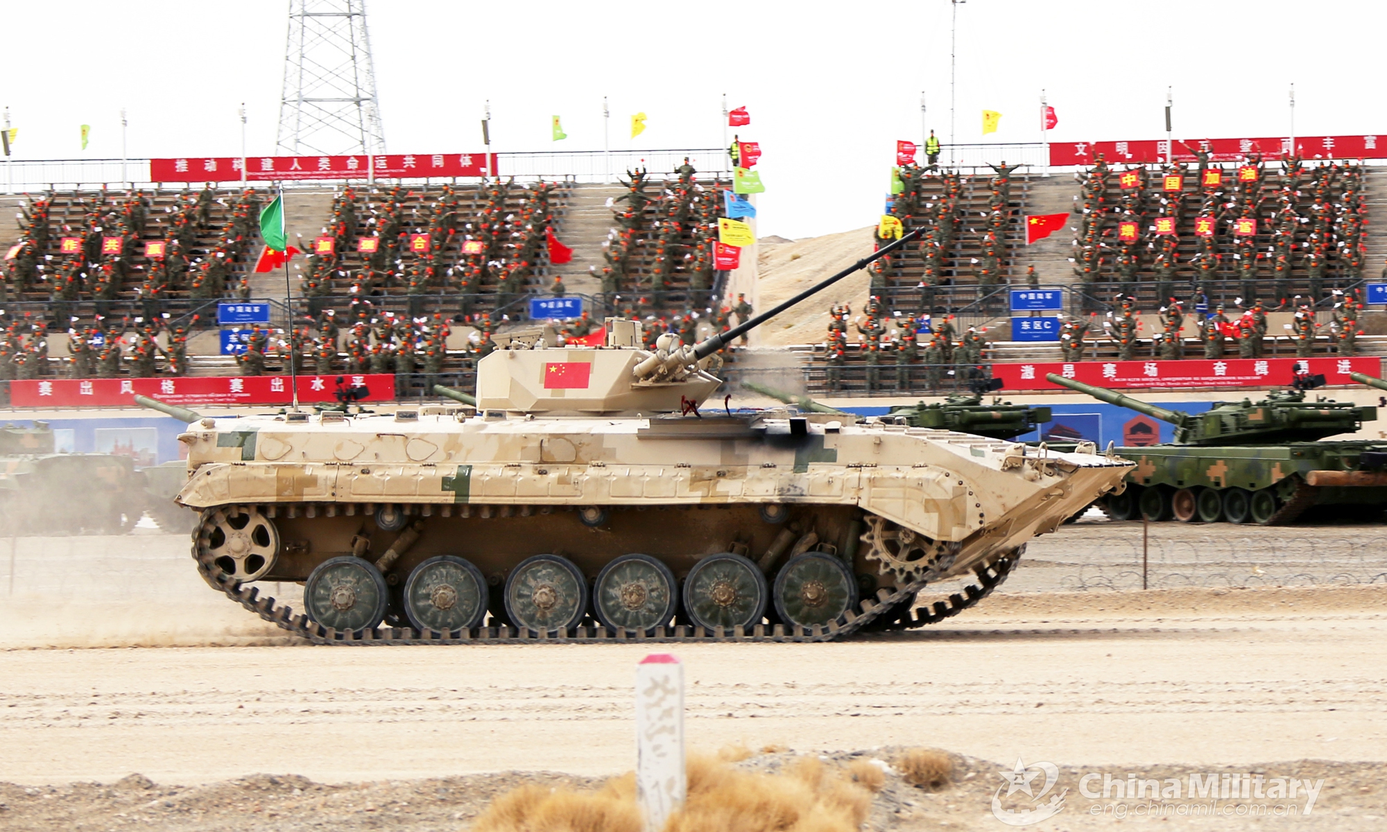 An infantry fighting vehicle of the Chinese team passes the viewing stand in the relay race, the last stage of Suvorov Onslaught contest of the International Army Games 2022 (IAG 2022) in Korla, China's Xinjiang Uygur Autonomous Region, on August 21, 2022.Photo:eng.chinamil.com.cn