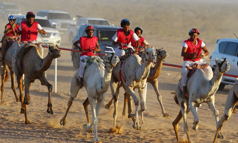 Participants compete in a camel race in El Alamein City, Egypt, on Aug. 23, 2022.(Photo: Xinhua)