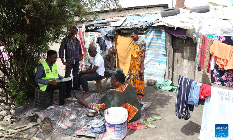 A census taker (1st L) conducts a population and housing information survey in Dar es Salaam, Tanzania on Aug. 23, 2022. Tanzania on Tuesday began conducting its National Population and Housing Census with President Samia Suluhu Hassan being among the first persons to be counted at State House in Chamwino in the capital Dodoma.(Photo: Xinhua)