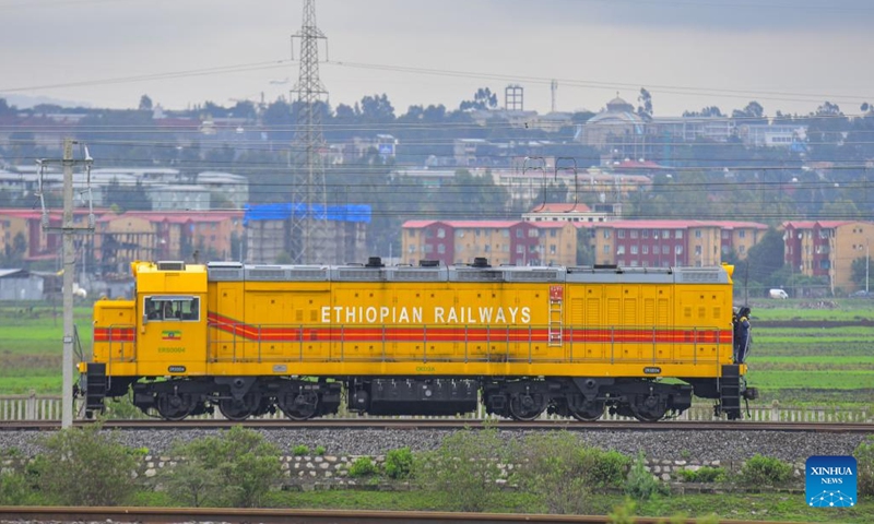 A locomotive is seen on the outskirts of Addis Ababa, Ethiopia, on Aug. 25, 2022. The Chinese-built Ethiopia-Djibouti railway on Thursday started vehicle shipment from ports in Djibouti to Addis Ababa, the Ethiopian capital. The first vehicle shipment arrived at the Indode Freight Station on the outskirts of Addis Ababa.(Photo: Xinhua)