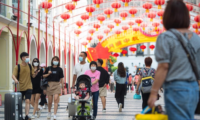 Visitors are seen at Senado Square in south China's Macao, Aug. 27, 2022.Photo:Xinhua