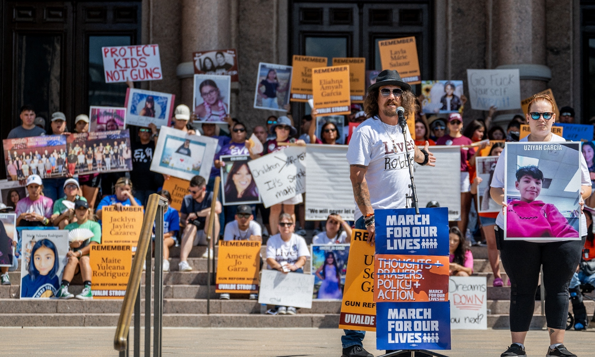 The Garcia family speak about their child Uziyah Garcia, who was murdered during the mass shooting at an elementary school in Uvalde, Texas, during a rally on August 27, 2022 in state capital Austin. Activists at the rally demanded raising the minimum age to 21 for the purchase of assault weapons. Photo: AFP