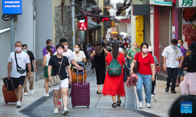 Visitors are seen at Senado Square in south China's Macao, Aug. 27, 2022.Photo:Xinhua