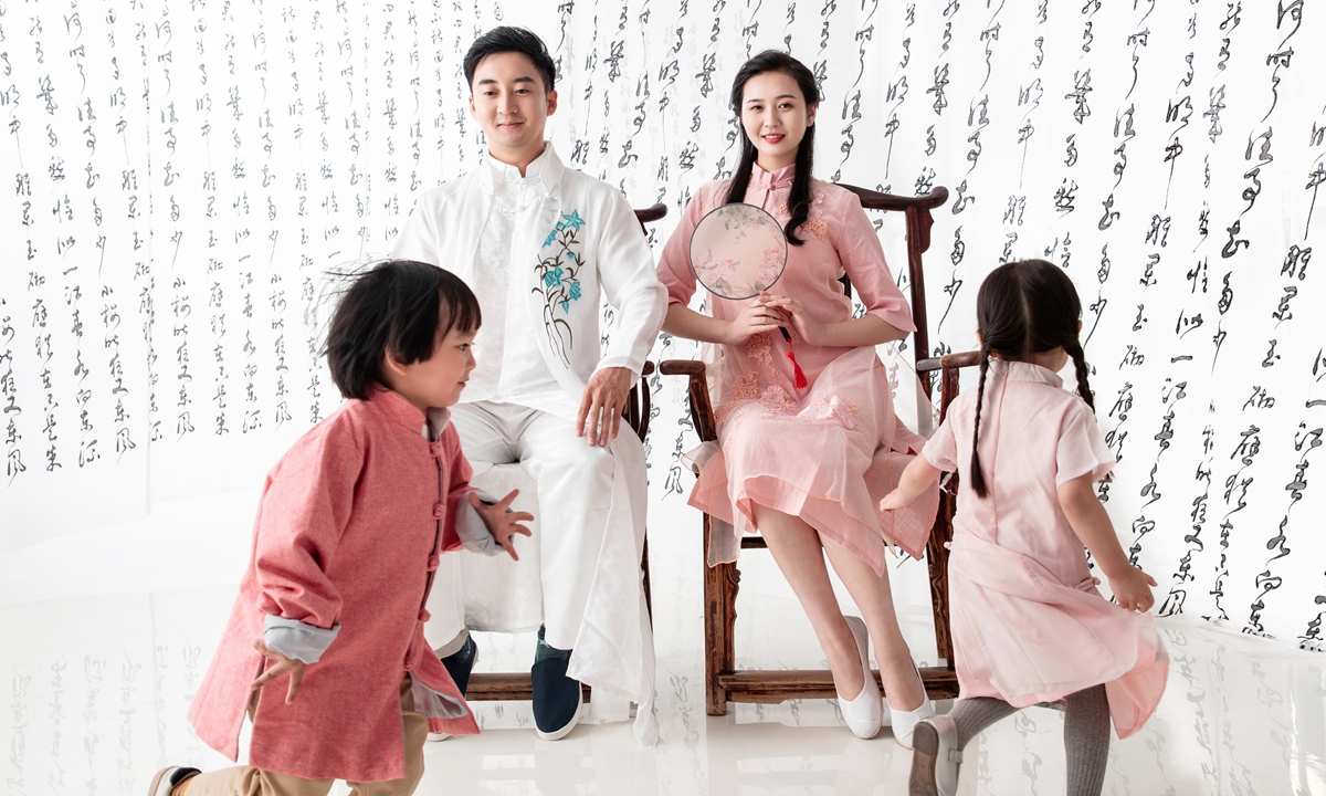 A family in Chinese style clothing Photo: VCG