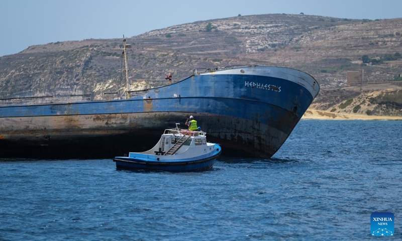 Photo taken on Aug. 29, 2022 shows an oil tanker being scuttled in Gozo, Malta. A 60-meter wide and 855-tonne heavy oil tanker was scuttled off Gozo island on Monday. It will start its new life as an artificial reef to attract divers from local and abroad. The tanker ran aground on the coast of Malta in February 2018 and got retired from service after being found the repair was too costly, according to Maltese media.(Photo: Xinhua)
