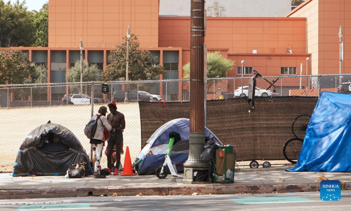 Tents housing the homeless line the sidewalk of a street in downtown Los Angeles, California, the United States, on Sep 8, 2022. Photo:Xinhua