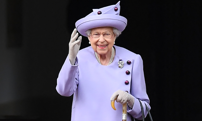 In this file photo taken on June 28, 2022 Britain's Queen Elizabeth II waves as she attends an Armed Forces Act of Loyalty Parade at the Palace of Holyroodhouse in Edinburgh, Scotland. Photo: VCG