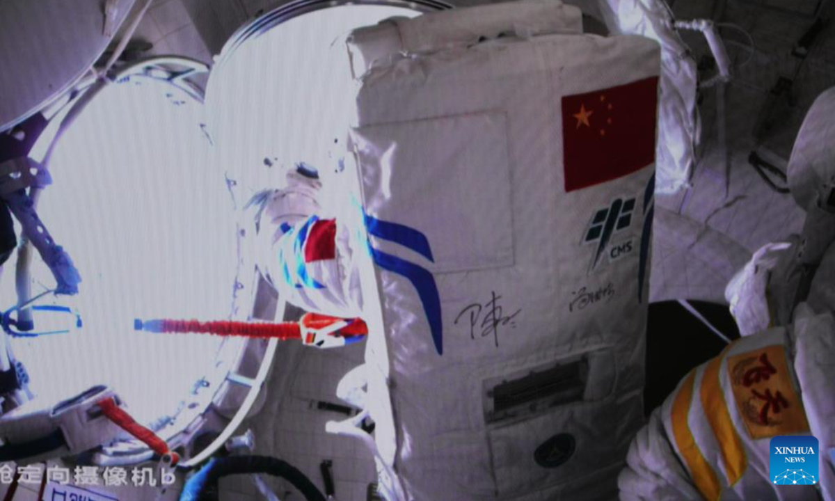 Screen image captured at Beijing Aerospace Control Center on Sept. 2, 2022 shows China's Shenzhou-14 astronaut Chen Dong closing the hatch of space station lab module Wentian's airlock cabin after completing extravehicular activities (EVAs). Photo:Xinhua