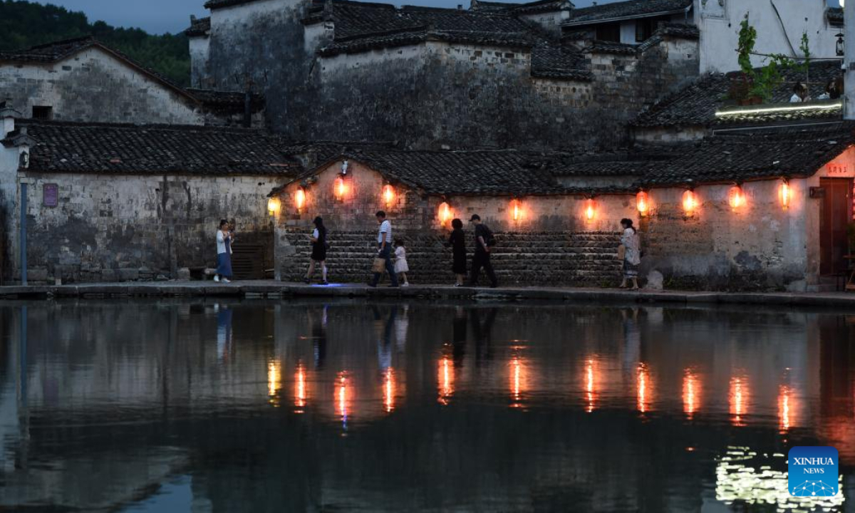 Tourists visit Hongcun Village in Yixian County, east China's Anhui Province, Aug. 31, 2022. Hongcun Village deeply integrates night economy with tourism industry to promote rural development. Photo:Xinhua