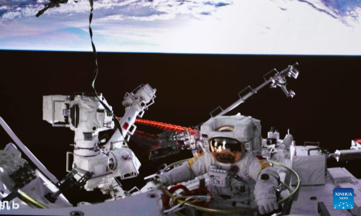 Screen image captured at Beijing Aerospace Control Center on Sep 17, 2022 shows Shenzhou-14 astronaut Cai Xuzhe exiting the space station lab module Wentian to conduct extravehicular activities (EVAs). Photo:Xinhua