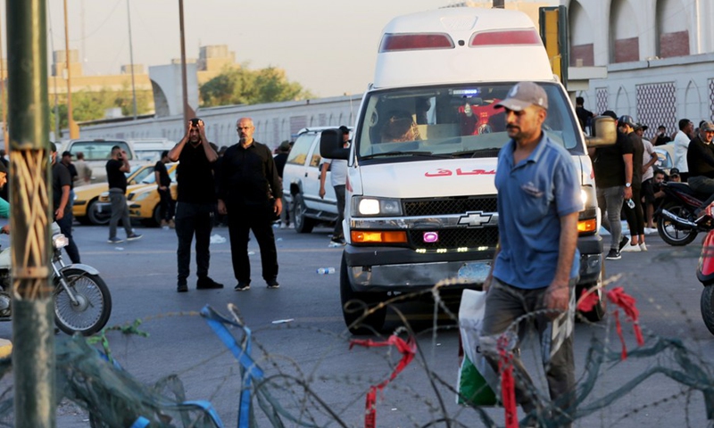 An ambulance transports injured protesters to a hospital in Baghdad, Iraq, on Aug. 29, 2022.(Photo: Xinhua)