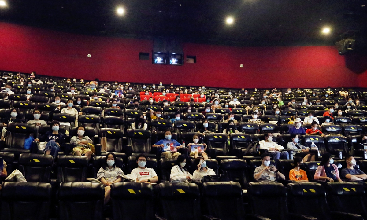 People watch films in a cinema in Shanghai. Photo: VCG