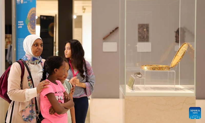 Visitors look at exhibits at Museum of Islamic Art in Cairo, Egypt, on Aug. 31, 2022. Museum of Islamic Art in Cairo, is considered to be one of the largest museums of Islamic art in the world, as it houses close to 100,000 antique Islamic artifacts.(Photo: Xinhua)