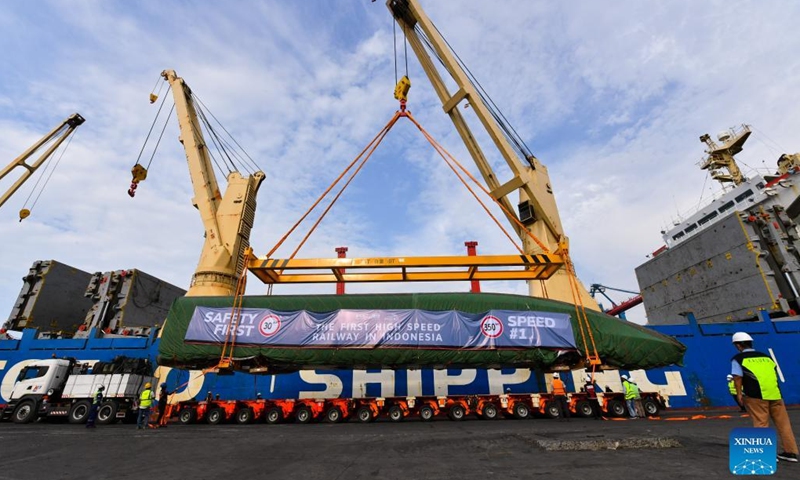 Photo taken on Sept. 2, 2022 shows a high-speed electric passenger train, customized for the Jakarta-Bandung high-speed railway, being unloaded from a vessel in Tanjung Priok Port in Jakarta, Indonesia. A high-speed electric passenger train and an inspection train, made in China and customized for the Jakarta-Bandung High-Speed Railway (HSR) project, arrived in the Jakarta Port from China's Qingdao Port on Thursday. (Photo: Xinhua)