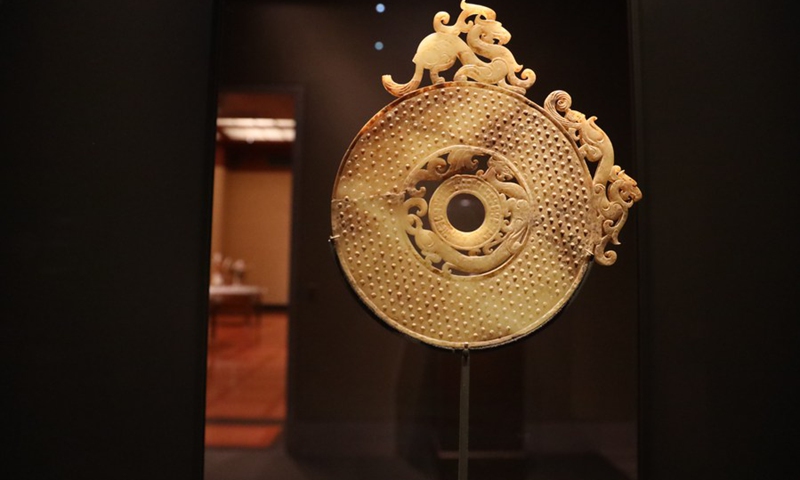 Photo taken on Aug. 11, 2022 shows a ritual jade disc with dragon motifs from the 3rd century BC, on display at the Nelson-Atkins Museum of Art in Kansas City, Missouri, United States.  (Photo: Xinhua)