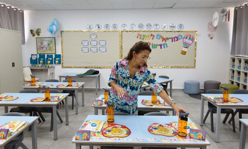 A teacher of an elementary school in the town of Hazor HaGalilit in northern Israel prepares for the new school year on Aug. 31, 2022.(Photo: Xinhua)