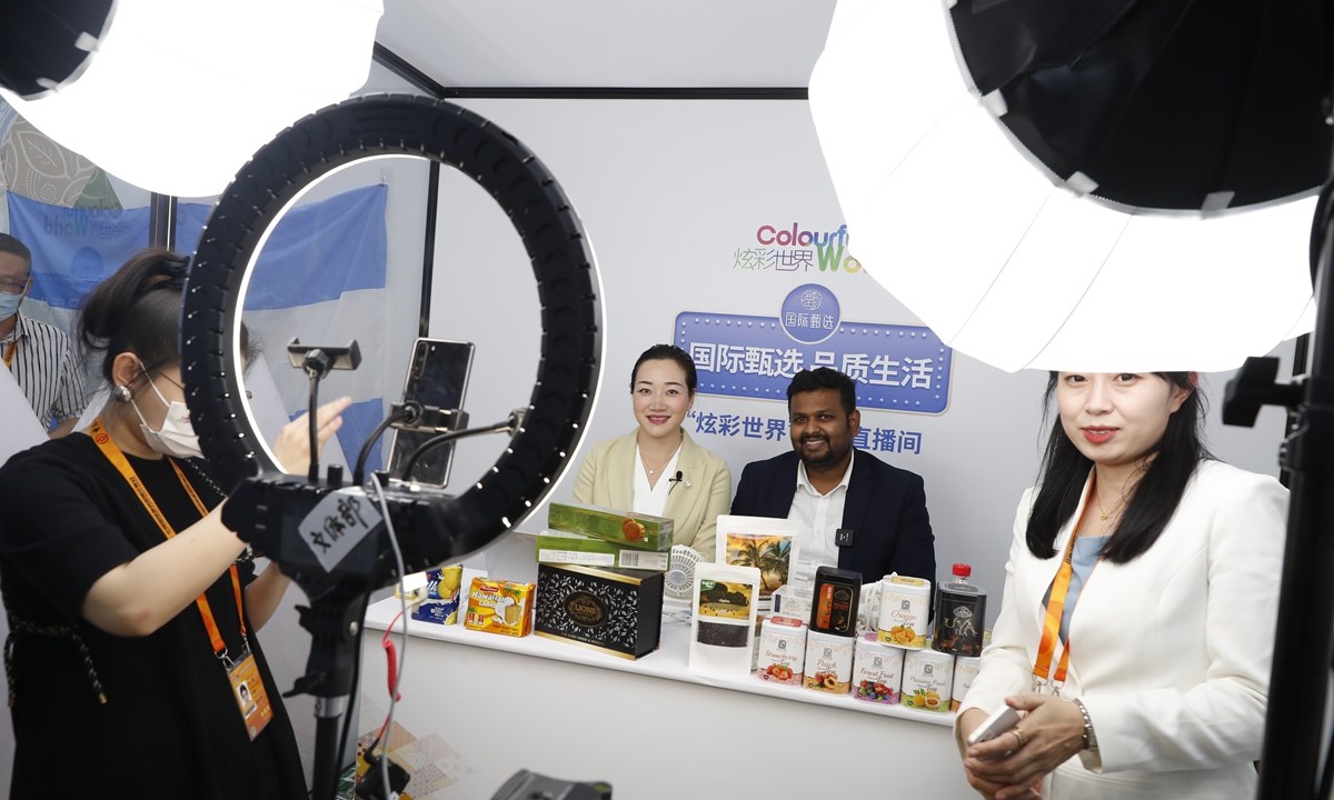 Chiranjaya Udumullage, president of the China Sri Lanka Association For Trade and Economic Cooperation, (second from right), attends a live commerce event on September 2 during the 2022 CIFTIS in Beijing. Photo: Courtesy of CRI Online 