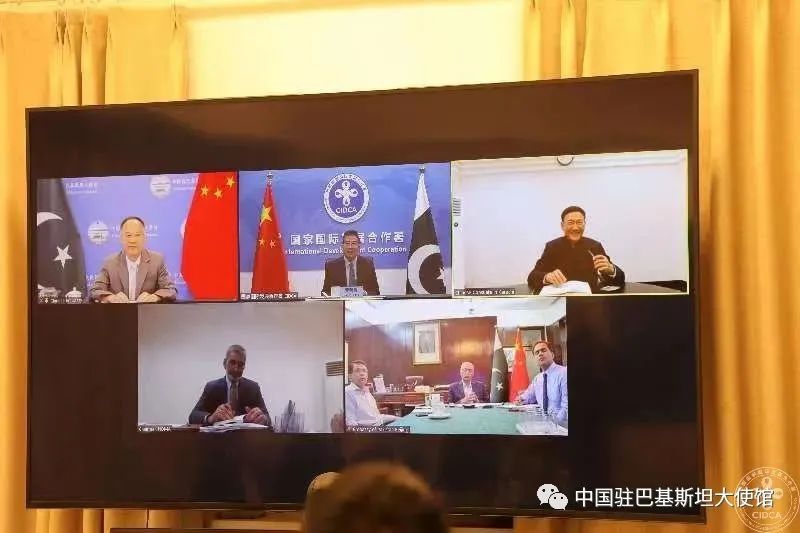 Luo Zhaohui, chairman of the China International Development Cooperation Agency, meets with AKhtar Nawaz, chairman of Pakistan's National Disaster Management Authority, on a conference via video link on September 3, 2022. Photo: Provided by Chinese Embassy in Pakistan.