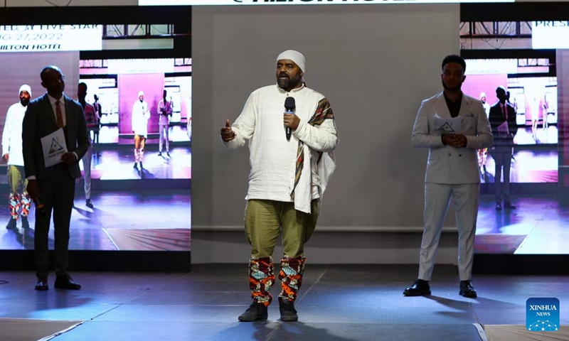 Ethiopian artist Michael Million speaks during the Afro Vision fashion show in Addis Ababa, Ethiopia on August 27, 2022. A Chinese and locally run company named Five Star Elevator Manufacturing Private Limited Company (PLC) announced that she had officially joined the entertainment industry with an event held at the Hilton Hotel in Addis Ababa, the Ethiopian capital.  (Photo: Xinhua)