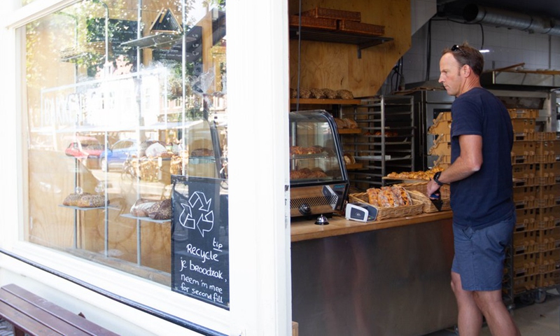 A customer shops at a bakery in Haarlem, the Netherlands, on Sept. 7, 2022.(Photo: Xinhua)