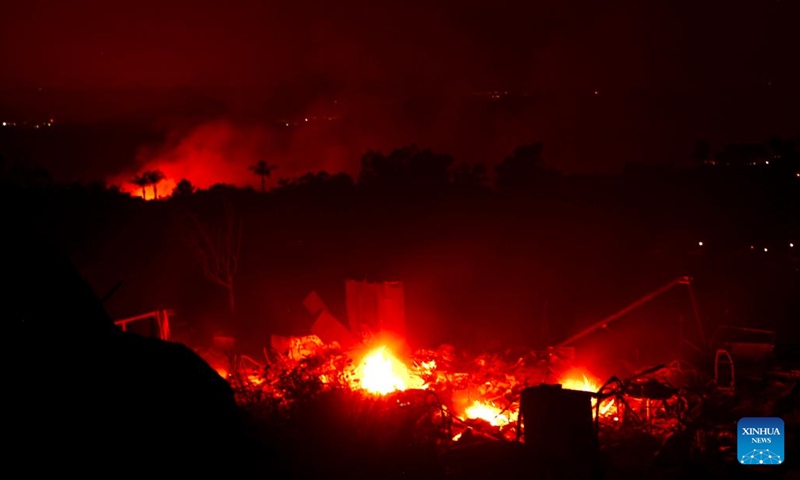 Photo taken on Sept. 6, 2022 shows a burning building in Hemet, Riverside County, California, the United States. A wildfire in Southern California that killed two people and injured a third has exploded to over 2,400 acres (9.71 square km) within 24 hours as of Tuesday morning, authorities said.(Photo: Xinhua)