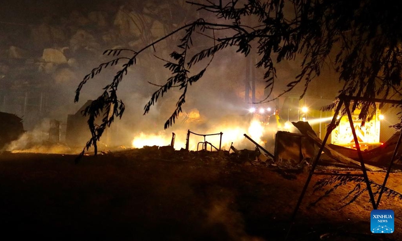 Photo taken on Sept. 6, 2022 shows a burning property in Hemet, Riverside County, California, the United States. A wildfire in Southern California that killed two people and injured a third has exploded to over 2,400 acres (9.71 square km) within 24 hours as of Tuesday morning, authorities said.(Photo: Xinhua)
