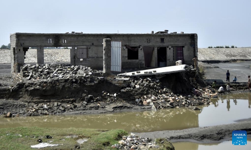 A damaged building is seen after heavy monsoon rain in northwest Pakistan's Nowshera on Sept. 6, 2022. At least 11 people were killed in heavy monsoon rain-triggered flash floods in the last 24 hours in Pakistan, the National Disaster Management Authority (NDMA) said.(Photo: Xinhua)