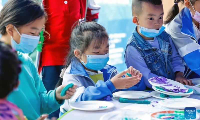 Kids play at a children's center at a quake relief shelter in Moxi Town of Luding County, southwest China's Sichuan Province, Sept. 7, 2022. A children's center has been built up at a quake relief shelter in Moxi Town to take care of children affected by the earthquake.(Photo: Xinhua)