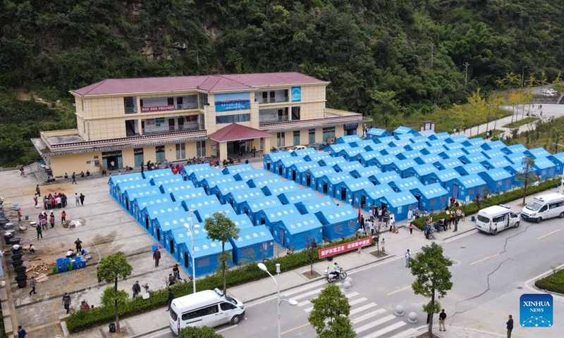 Aerial photo taken on Sept. 6, 2022 shows a quake relief shelter in Wajiao Village of Wanggangping Township in Shimian County of Ya'an City, southwest China's Sichuan Province.(Photo: Xinhua)