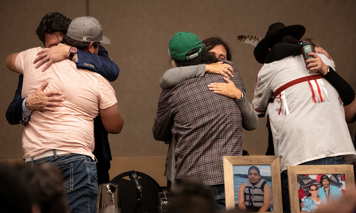 The relatives of those killed or wounded in a series of stabbings on the James Smith Cree Nation reserve in the Canadian province of Saskatchewan hug following a news conference on September 7, 2022. Myles Sanderson, 32, and his brother Damien, 30, both deceased, are accused of killing 10 people and wounding 18 in a string of attacks.Photo: VCG