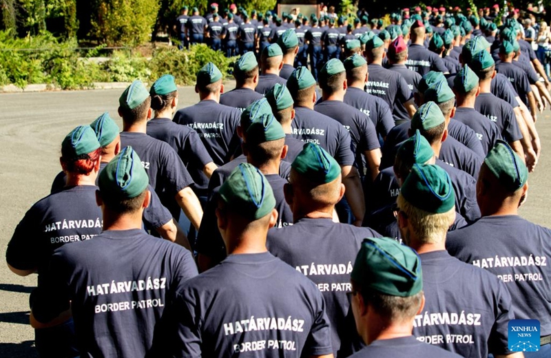 Members of Hungary's first border hunter regiment march after they take their oath of office at an inauguration ceremony in Budapest, Hungary on Sept. 9, 2022. The first border hunter regiment was inaugurated here on Friday. (Photo by Attila Volgyi/Xinhua)
