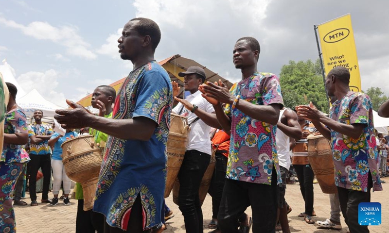 People dance and sing to celebrate the yam festival in the city of Ho, Ghana, on Sept. 10, 2022.Photo:Xinhua