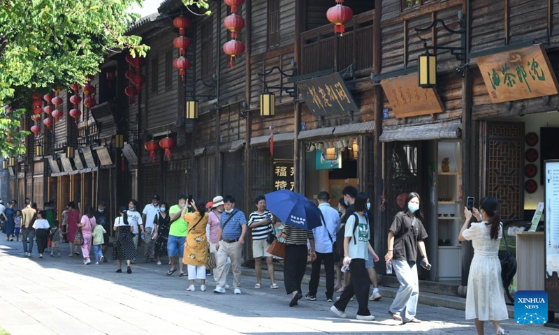 People visit Sanfangqixiang (Three Lanes and Seven Alleys), an ancient block, during the Mid-Autumn Festival holiday in Fuzhou, southeast China's Fujian Province, Sept. 11, 2022.Photo:Xinhua