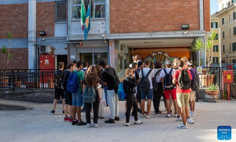 Students wait to enter classrooms at a high school as a new semester starts in Rome, Italy, Sept. 12, 2022.Photo:Xinhua