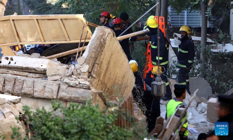 Rescuers search for survivors after a residential building collapsed in Amman, Jordan, on Sept. 13, 2022. The death toll in the residential building collapse in Amman on Tuesday rose to five, the Public Security Department (PSD) said in a statement.(Photo: Xinhua)