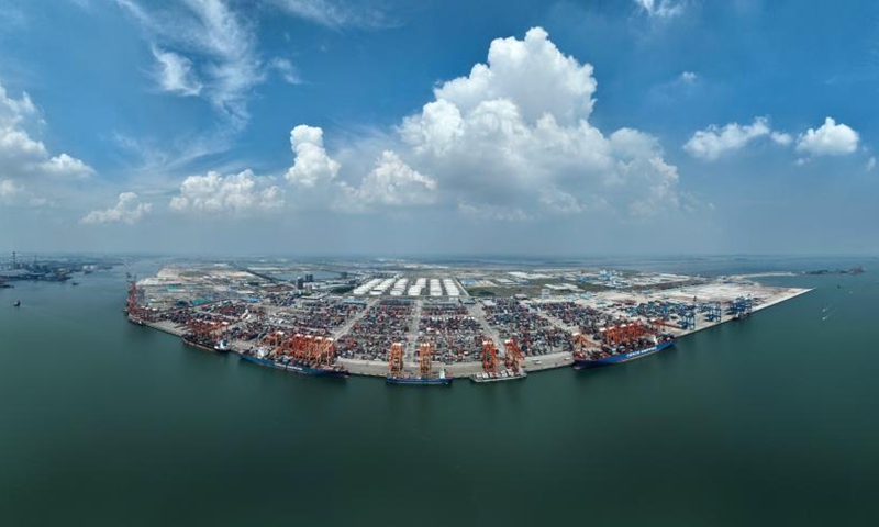 Aerial photo taken on Sept. 13, 2022 shows the Qinzhou Port in Qinzhou, south China's Guangxi Zhuang Autonomous Region. After 30 years of development, the Qinzhou Port has been constructed into an international sea-rail intermodal container terminal, operating more than 60 container service routes with a connection to more than 200 ports in over 100 countries and regions around the world.(Photo: Xinhua)