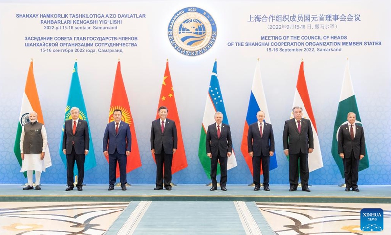 Chinese President Xi Jinping poses for a group photo with other leaders of the Shanghai Cooperation Organization (SCO) member states before the restricted session of the 22nd meeting of the Council of Heads of State of the SCO at the International Conference Center in Samarkand, Uzbekistan,on September 16, 2022. Xi attended the restricted session here on Friday. Photo: Xinhua/Li Tao
