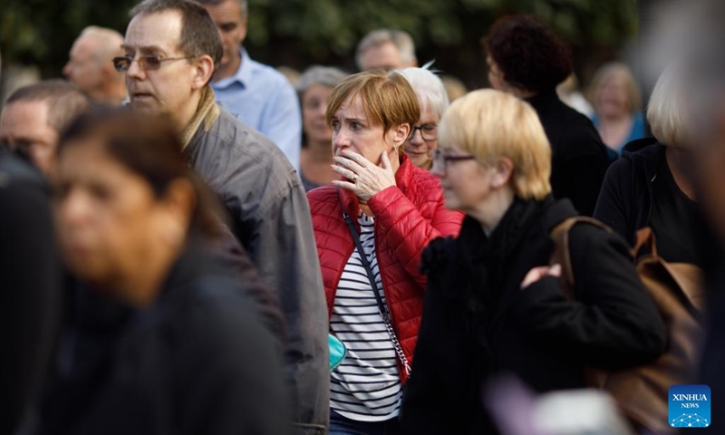People leave Westminster Hall after paying tributes to the late Queen Elizabeth II in London, Britain, Sept. 15, 2022. The Queen will lie in state in Westminster Hall for several days before her funeral on Sept. 19.(Photo: Xinhua)
