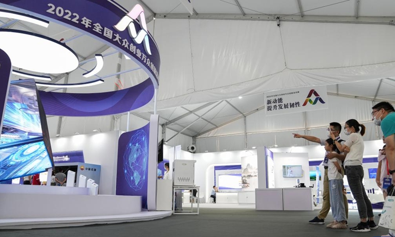 People visit the main venue of 2022 national mass entrepreneurship and innovation week in Hefei, capital of east China's Anhui Province, Sept. 17, 2022.Photo:Xinhua