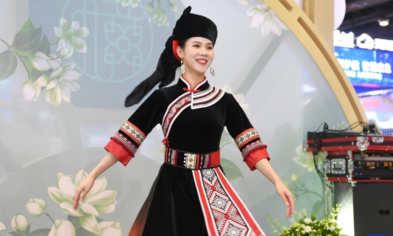 A performer dressed in folk costume is seen during the 19th China-ASEAN Expo in Nanning, south China's Guangxi Zhuang Autonomous Region, Sept. 17, 2022.Photo:Xinhua